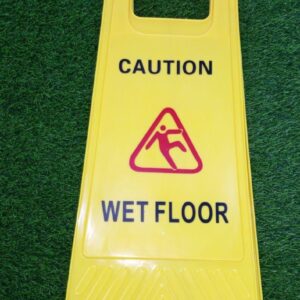 Durable wet floor sign with clear printing to warn of slippery surfaces and prevent accidents